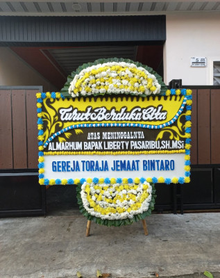 Papan Bunga Duka di Pianggu